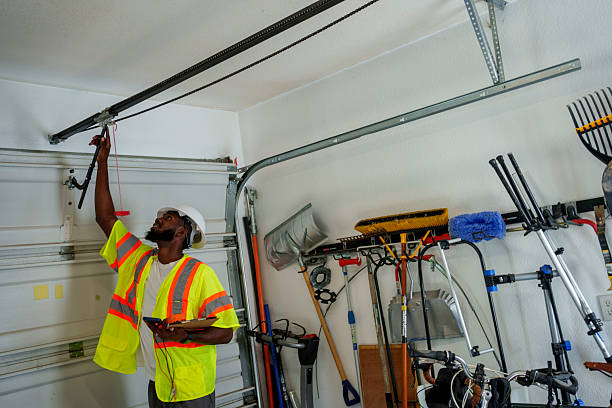 Professional Garage Door Panel Replacement technician working in Brewerton, NY
